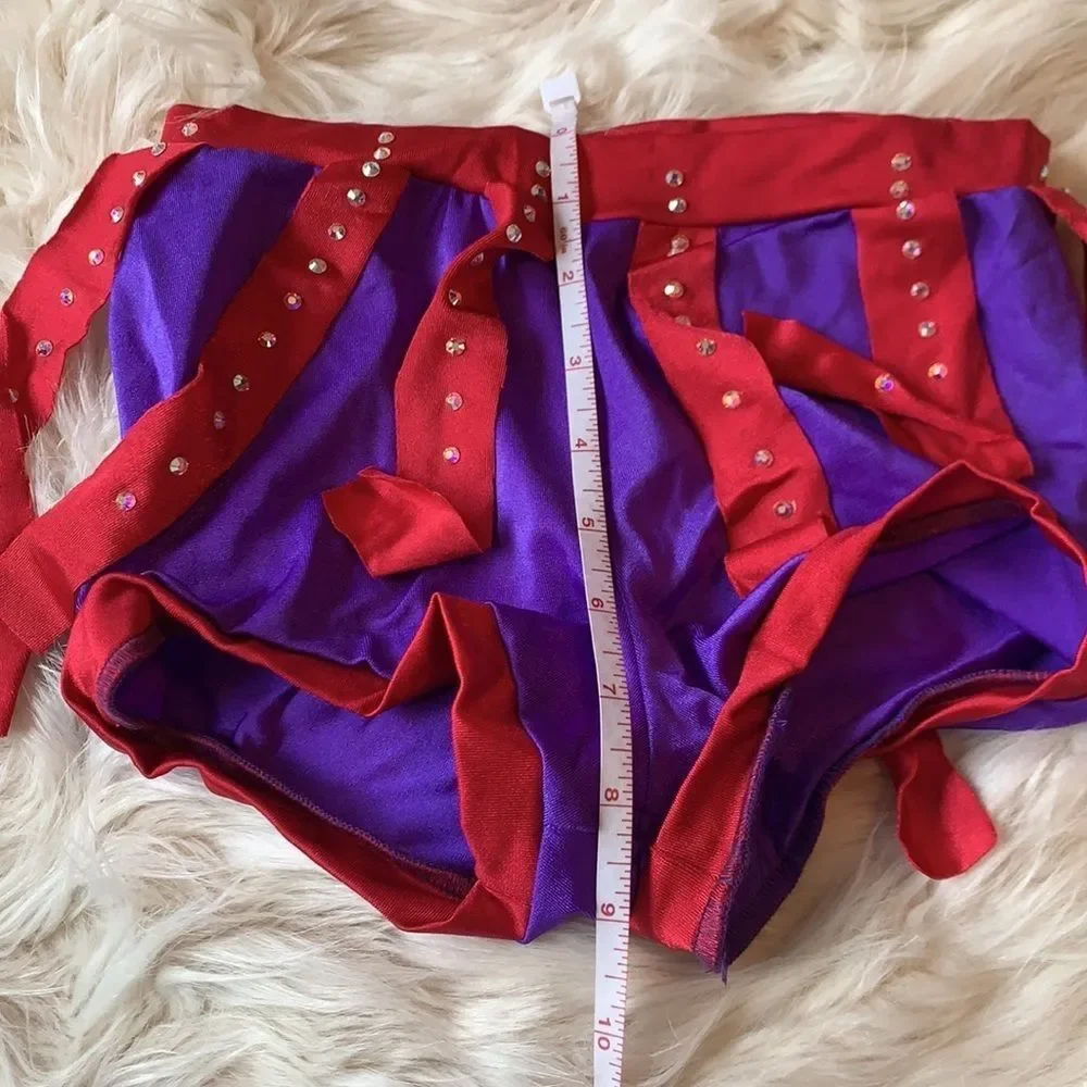 Custom dance costume with Swarovski crystals. Orange, Red and Purple Two Piece